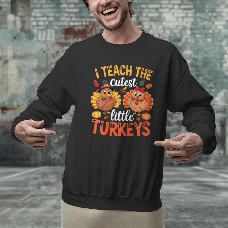 I Teach The Cutest Little Turkeys Teacher Thanksgiving Men Graphic Sweatshirt, gift for family, gift for coworker I Teach The Cutest Little Turkeys Teacher Thanksgiving Men Graphic Sweatshirt, gift for family, gift for coworker