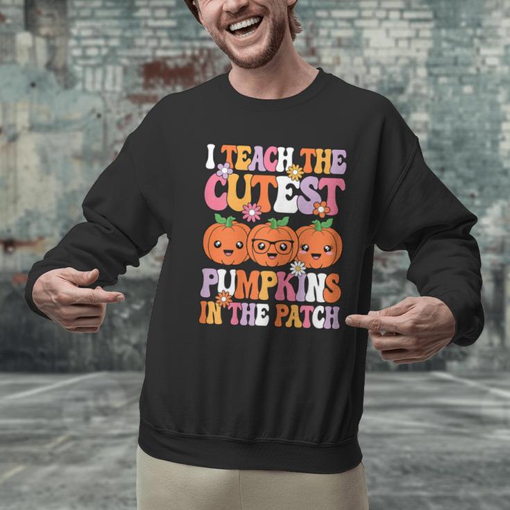 I Teach The Cutest Pumpkins Halloween Fall Teacher Women Men Graphic Sweatshirt, gift for family, gift for coworker