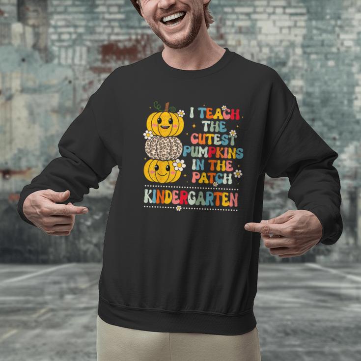 I Teach The Cutest Pumpkins Kindergarten Teacher Halloween Men Graphic Sweatshirt, gift for family, gift for coworker