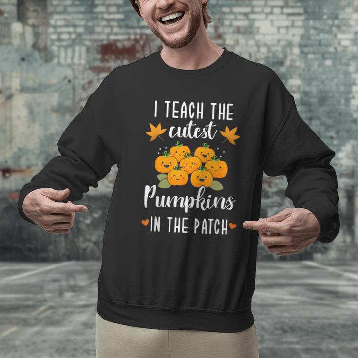 I Teach The Cutest Pumpkins In The Patch Halloween Teacher Men Graphic Sweatshirt, gift for family, gift for coworker I Teach The Cutest Pumpkins In The Patch Halloween Teacher Men Graphic Sweatshirt, gift for family, gift for coworker
