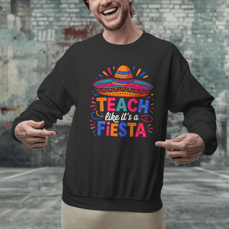 Teach Like It'S A Fiesta Teachers Sombrero Cinco De Mayo Men Graphic Sweatshirt, gift for family, gift for coworker Teach Like It'S A Fiesta Teachers Sombrero Cinco De Mayo Men Graphic Sweatshirt, gift for family, gift for coworker