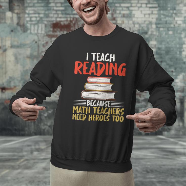 I Teach Reading Because Math Teachers Need Heroes Too Men Women Men Graphic Sweatshirt, gift for family, gift for coworker I Teach Reading Because Math Teachers Need Heroes Too Men Women Men Graphic Sweatshirt, gift for family, gift for coworker