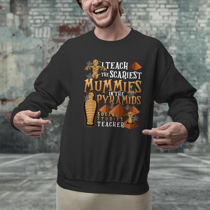 Teach The Scariest Mummies Halloween Social Studies Teacher Men Women Men Graphic Sweatshirt, gift for family, gift for coworker Teach The Scariest Mummies Halloween Social Studies Teacher Men Women Men Graphic Sweatshirt, gift for family, gift for coworker