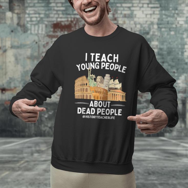 I Teach Young People About Dead People History Teachers Men Graphic Sweatshirt, History Teacher Sweatshirts, gift for family, gift for coworker I Teach Young People About Dead People History Teachers Men Graphic Sweatshirt, History Teacher Sweatshirts, gift for family, gift for coworker