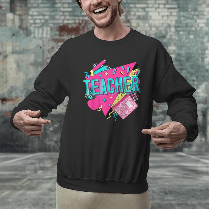 Teacher 90s Retro Colorful Teacher Of The 90s Back To School Men Graphic Sweatshirt, 90s Teacher Sweatshirts, gift for family, gift for coworker Teacher 90s Retro Colorful Teacher Of The 90s Back To School Men Graphic Sweatshirt, 90s Teacher Sweatshirts, gift for family, gift for coworker