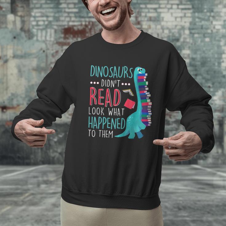 Teacher Dinosaurs Didnt Read Look What Happened Book Reading Men Graphic Sweatshirt, gift for family, gift for coworker Teacher Dinosaurs Didnt Read Look What Happened Book Reading Men Graphic Sweatshirt, gift for family, gift for coworker