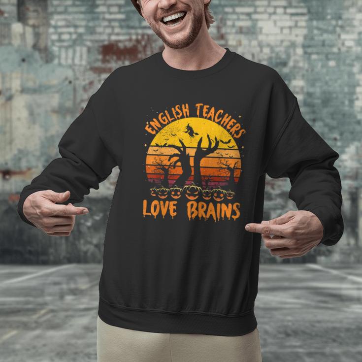 Teacher Halloween All English Teachers Love Brains Men Graphic Sweatshirt, English Teacher Sweatshirts, gift for family, gift for coworker Teacher Halloween All English Teachers Love Brains Men Graphic Sweatshirt, English Teacher Sweatshirts, gift for family, gift for coworker