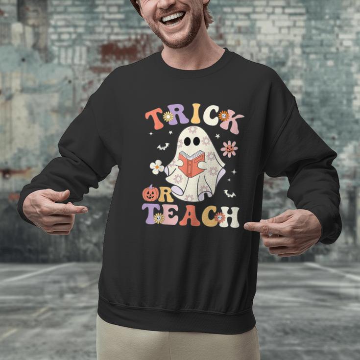 Teacher Halloween Trick Or Teach Floral Ghost Men Graphic Sweatshirt, gift for family, gift for coworker Teacher Halloween Trick Or Teach Floral Ghost Men Graphic Sweatshirt, gift for family, gift for coworker