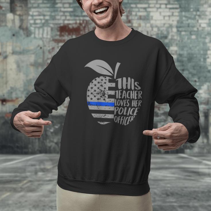 This Teacher Loves Her Police Officer Wife Saying Men Graphic Sweatshirt, gift for family, gift for coworker This Teacher Loves Her Police Officer Wife Saying Men Graphic Sweatshirt, gift for family, gift for coworker