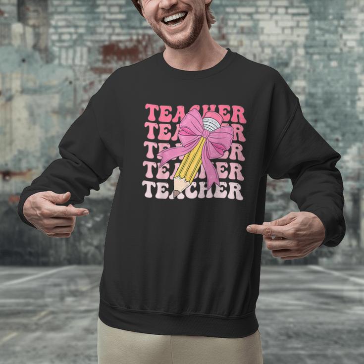 Teacher Pencil Back To School Groovy Pink Teacher First Day Men Graphic Sweatshirt, Groovy Teacher Sweatshirts, gift for family, gift for coworker Teacher Pencil Back To School Groovy Pink Teacher First Day Men Graphic Sweatshirt, Groovy Teacher Sweatshirts, gift for family, gift for coworker