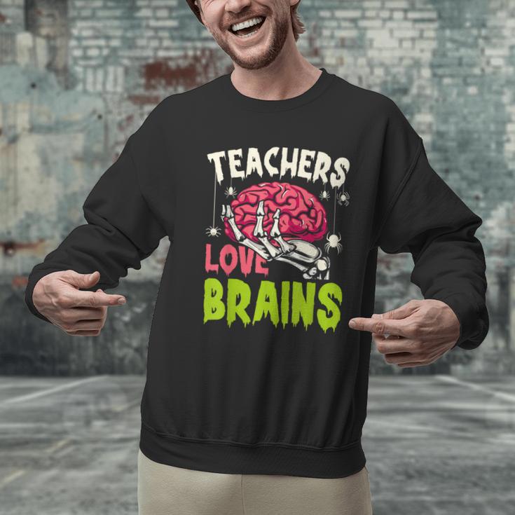 Teachers Love Brains Skeleton Halloween Teacher Funny Men Graphic Sweatshirt, gift for family, gift for coworker Teachers Love Brains Skeleton Halloween Teacher Funny Men Graphic Sweatshirt, gift for family, gift for coworker