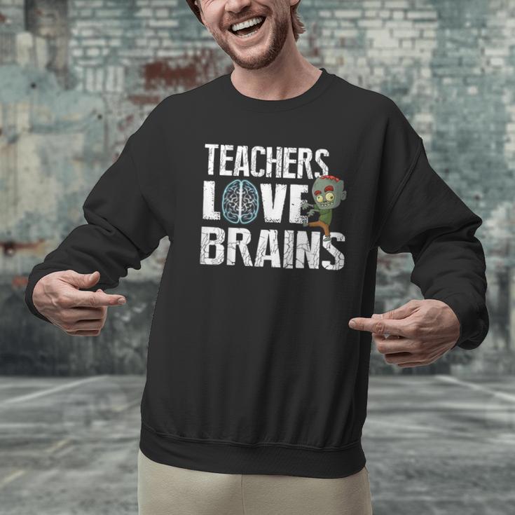 Teachers Love Brains Zombie Halloween Hilarious Men Graphic Sweatshirt, gift for family, gift for coworker Teachers Love Brains Zombie Halloween Hilarious Men Graphic Sweatshirt, gift for family, gift for coworker