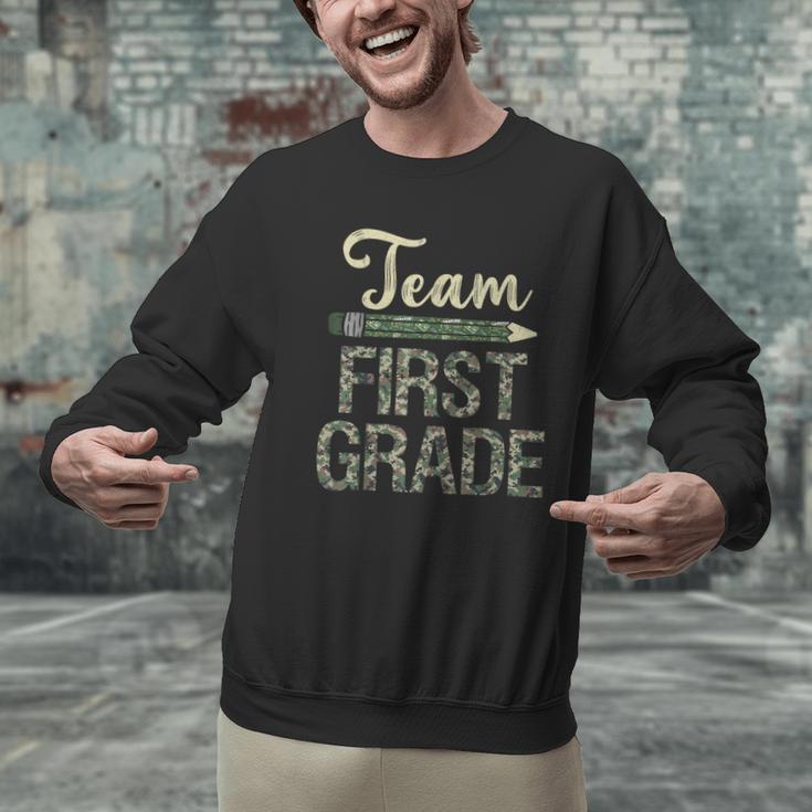Team First Grade Camo 1st Grade Teacher Camouflage Men Graphic Sweatshirt, First Grade Teacher Sweatshirts, gift for family, gift for coworker Team First Grade Camo 1st Grade Teacher Camouflage Men Graphic Sweatshirt, First Grade Teacher Sweatshirts, gift for family, gift for coworker