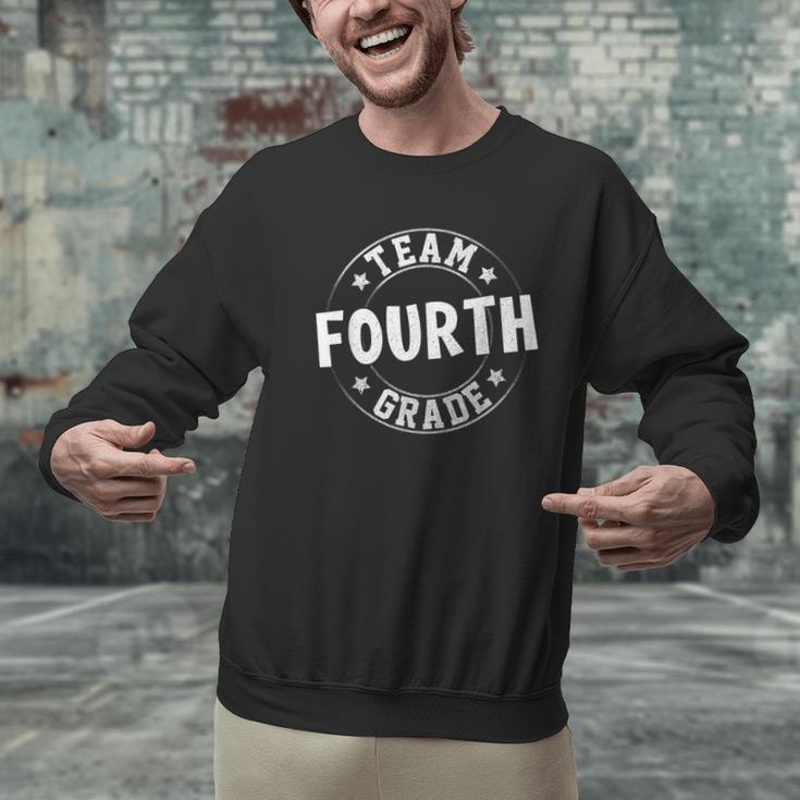 Team Fourth Grade Teacher Student Back To School 4th Grade Men Graphic Sweatshirt, 4th Grade Teacher Sweatshirts, gift for family, gift for coworker Team Fourth Grade Teacher Student Back To School 4th Grade Men Graphic Sweatshirt, 4th Grade Teacher Sweatshirts, gift for family, gift for coworker