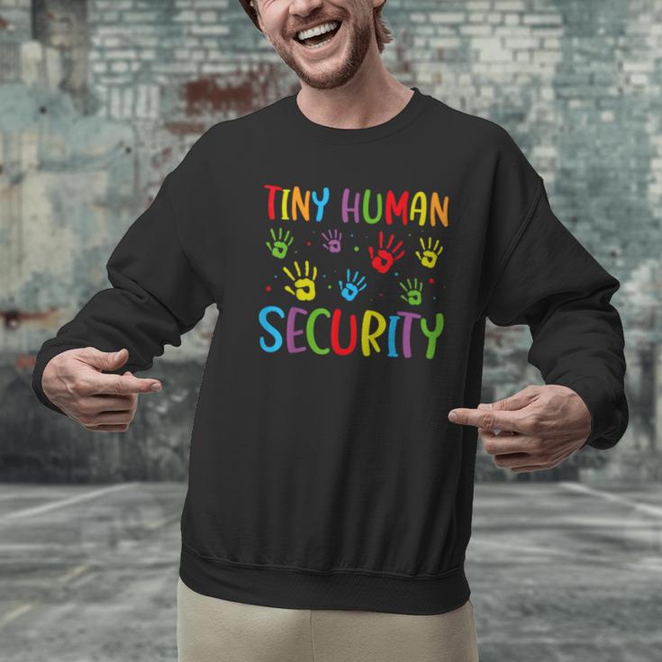 Tiny Human Security Preschool Childcare Teacher Babysitters Men Graphic Sweatshirt, gift for family, gift for coworker Tiny Human Security Preschool Childcare Teacher Babysitters Men Graphic Sweatshirt, gift for family, gift for coworker