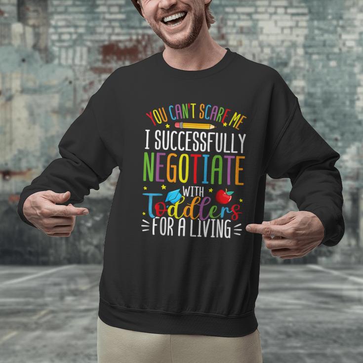 Toddler Negotiator Preschool Teacher Humor Babysitters Men Graphic Sweatshirt, gift for family, gift for coworker Toddler Negotiator Preschool Teacher Humor Babysitters Men Graphic Sweatshirt, gift for family, gift for coworker