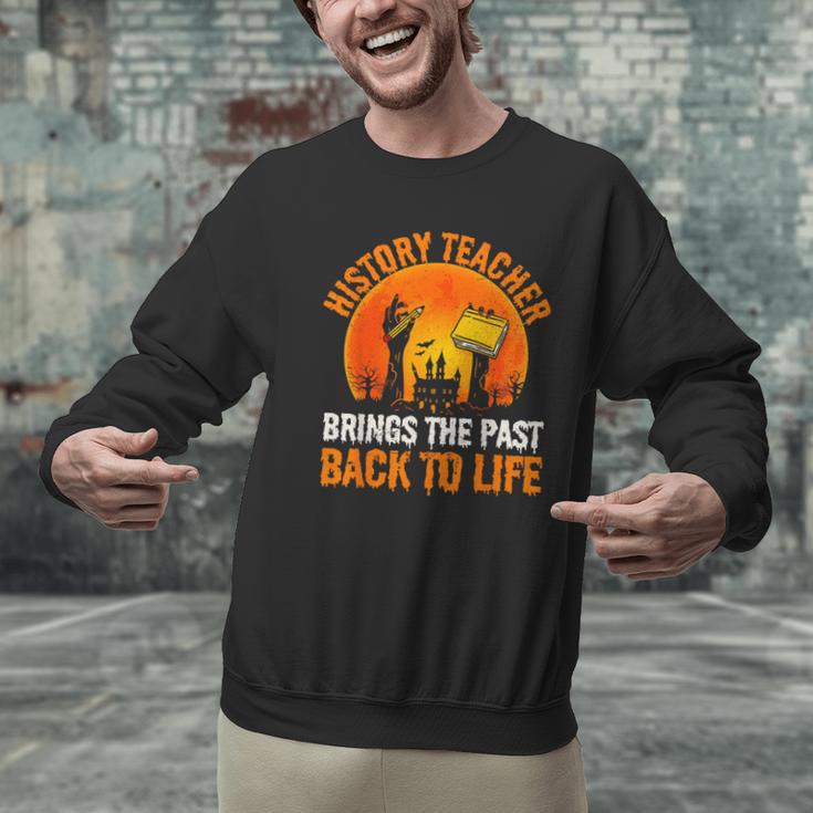 History Teacher Brings Past Back To Life Halloween Zombie Men Graphic Sweatshirt, History Teacher Sweatshirts, gift for family, gift for coworker History Teacher Brings Past Back To Life Halloween Zombie Men Graphic Sweatshirt, History Teacher Sweatshirts, gift for family, gift for coworker