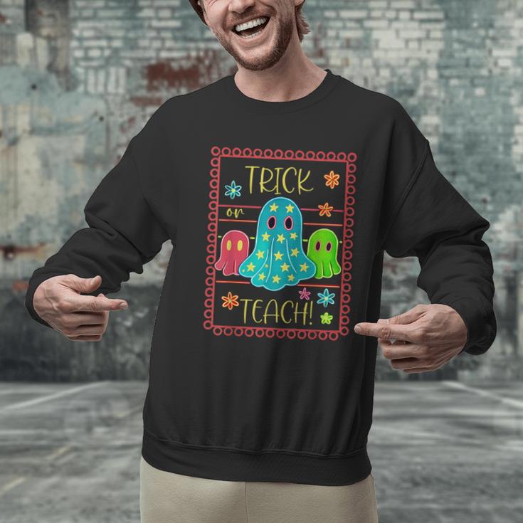 Trick Or Teach Neon Ghost Flower Teacher Spooky Halloween Men Graphic Sweatshirt, gift for family, gift for coworker Trick Or Teach Neon Ghost Flower Teacher Spooky Halloween Men Graphic Sweatshirt, gift for family, gift for coworker