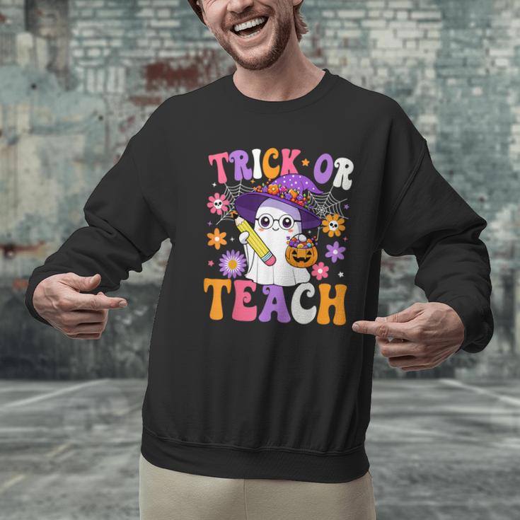 Trick Or Teach Teacher Ghost Teaching Fun Halloween Teacher Men Graphic Sweatshirt, gift for family, gift for coworker Trick Or Teach Teacher Ghost Teaching Fun Halloween Teacher Men Graphic Sweatshirt, gift for family, gift for coworker
