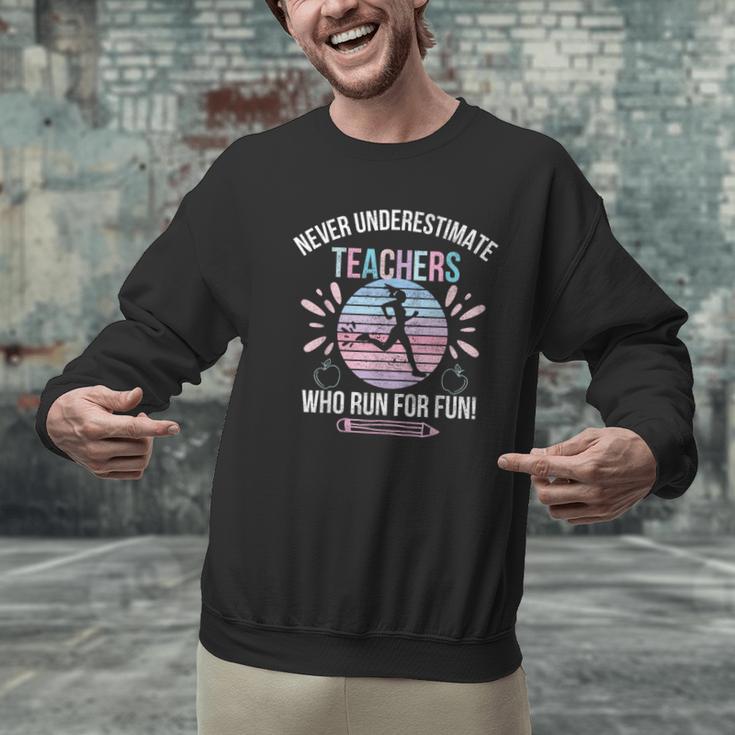 Never Underestimate Teachers Who Runs For Fun Running Teache Men Graphic Sweatshirt, gift for family, gift for coworker Never Underestimate Teachers Who Runs For Fun Running Teache Men Graphic Sweatshirt, gift for family, gift for coworker
