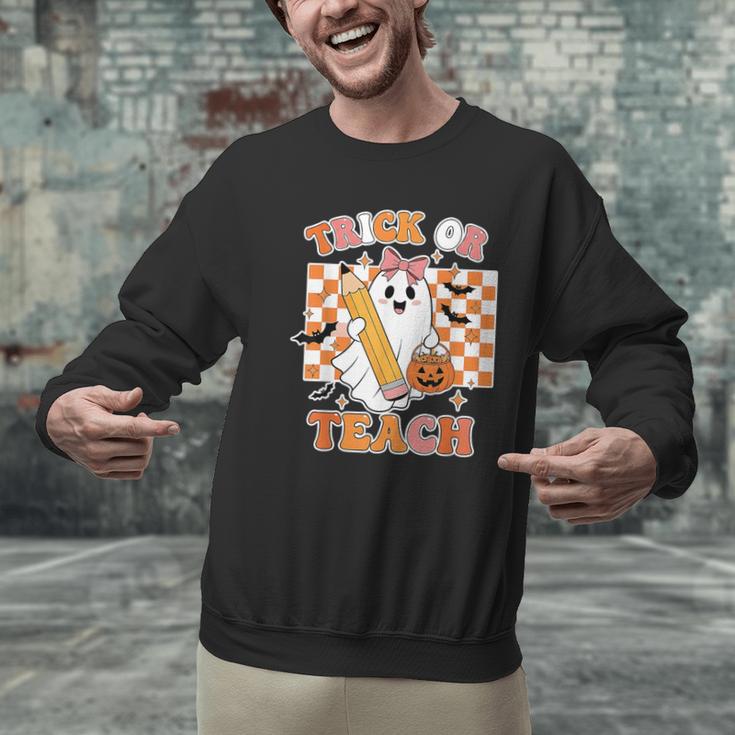 Vintage Teacher Shirt Women Trick Or Teach Halloween Men Graphic Sweatshirt, gift for family, gift for coworker Vintage Teacher Shirt Women Trick Or Teach Halloween Men Graphic Sweatshirt, gift for family, gift for coworker