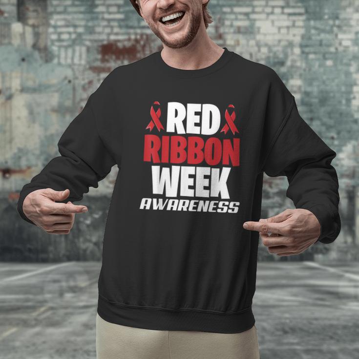 We Wear Red For Red Ribbon Week Awareness Mothers Teachers Men Graphic Sweatshirt, gift for family, gift for coworker We Wear Red For Red Ribbon Week Awareness Mothers Teachers Men Graphic Sweatshirt, gift for family, gift for coworker