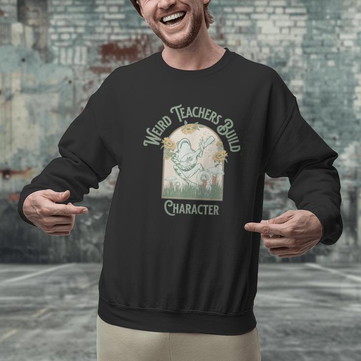Weird Teachers Build Character- Teacher's Day Men Graphic Sweatshirt, gift for family, gift for coworker Weird Teachers Build Character- Teacher's Day Men Graphic Sweatshirt, gift for family, gift for coworker