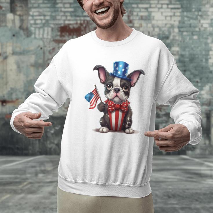 Boston Terrier Puppy Dog Holds His American Flag 4th Of July Men Graphic Sweatshirt, American Boston Terrier Sweatshirts, Boston Terrier 4th Of July Sweatshirts, gift for family, gift for coworker