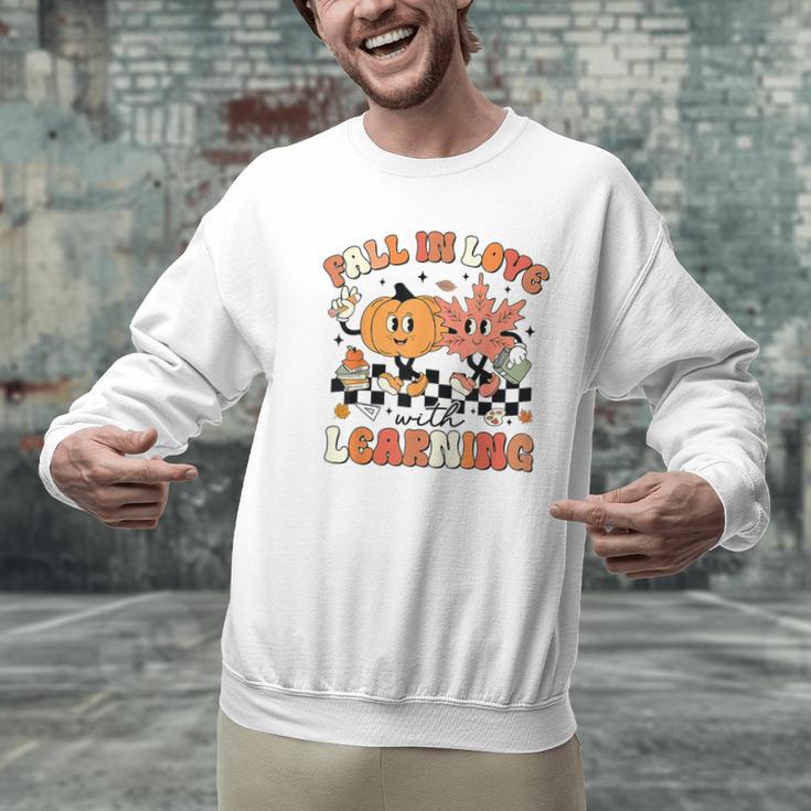 Fall In Love With Learning Teacher Retro Thanksgiving Men Graphic Sweatshirt, gift for family, gift for coworker Fall In Love With Learning Teacher Retro Thanksgiving Men Graphic Sweatshirt, gift for family, gift for coworker