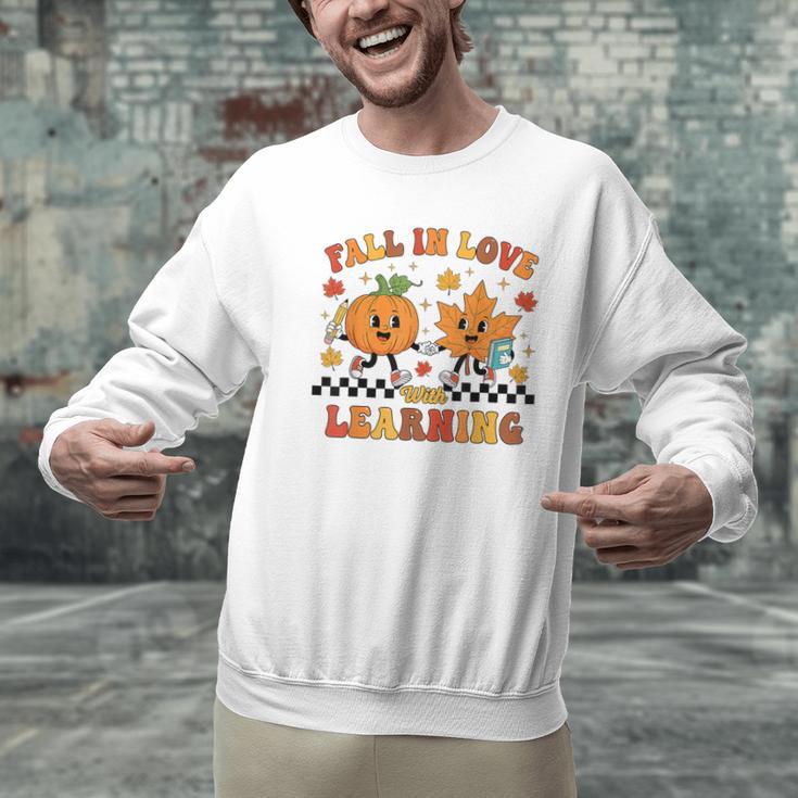Fall In Love With Learning Teacher Student Autumn Pumpkin Men Graphic Sweatshirt, gift for family, gift for coworker Fall In Love With Learning Teacher Student Autumn Pumpkin Men Graphic Sweatshirt, gift for family, gift for coworker