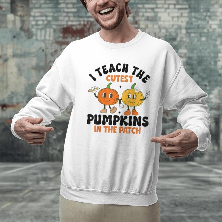 Halloween Teacher I Teach The Cutest Pumpkins In The Patch Men Graphic Sweatshirt, gift for family, gift for coworker Halloween Teacher I Teach The Cutest Pumpkins In The Patch Men Graphic Sweatshirt, gift for family, gift for coworker