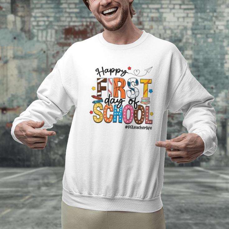 Happy First Day Of School PE Teacher Life Back To School Men Graphic Sweatshirt, Pe Teacher Sweatshirts, gift for family, gift for coworker Happy First Day Of School PE Teacher Life Back To School Men Graphic Sweatshirt, Pe Teacher Sweatshirts, gift for family, gift for coworker