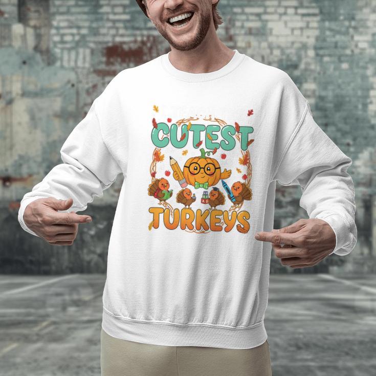 Humor I Teach The Cutest Turkeys Thanksgiving Teacher Men Graphic Sweatshirt, gift for family, gift for coworker