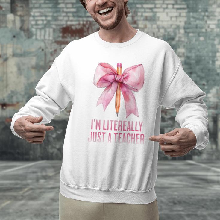 I'm Literally Just a Teacher Pencil Coquette Bow School Men Graphic Sweatshirt, gift for family, gift for coworker I'm Literally Just a Teacher Pencil Coquette Bow School Men Graphic Sweatshirt, gift for family, gift for coworker