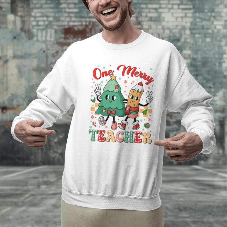 One Merry Teacher Groovy Christmas Tree Pjs Xmas Teacher Men Graphic Sweatshirt, Groovy Teacher Sweatshirts, gift for family, gift for coworker
