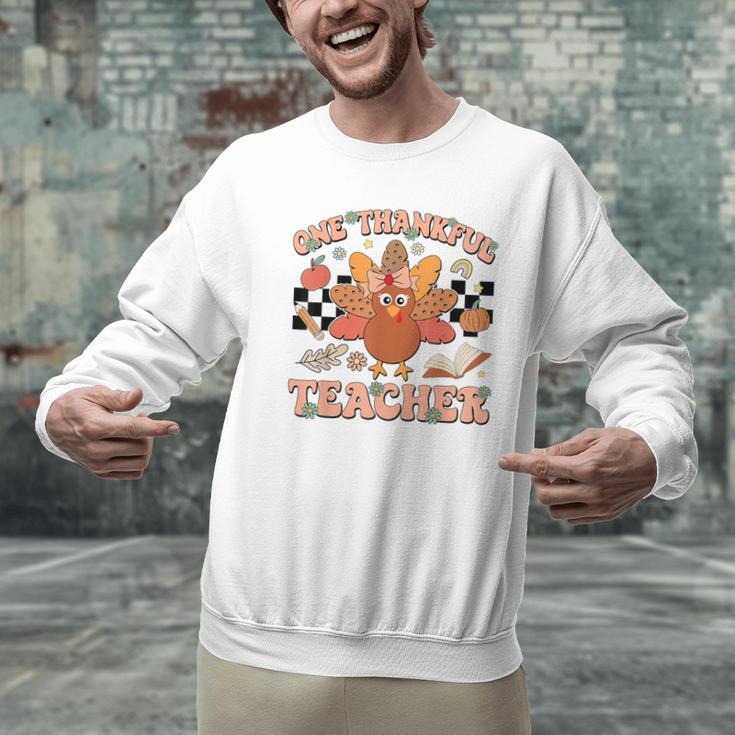 One Thankful Teacher Thanksgiving Retro Groovy Fall Teachers Men Graphic Sweatshirt, Groovy Teacher Sweatshirts, gift for family, gift for coworker One Thankful Teacher Thanksgiving Retro Groovy Fall Teachers Men Graphic Sweatshirt, Groovy Teacher Sweatshirts, gift for family, gift for coworker