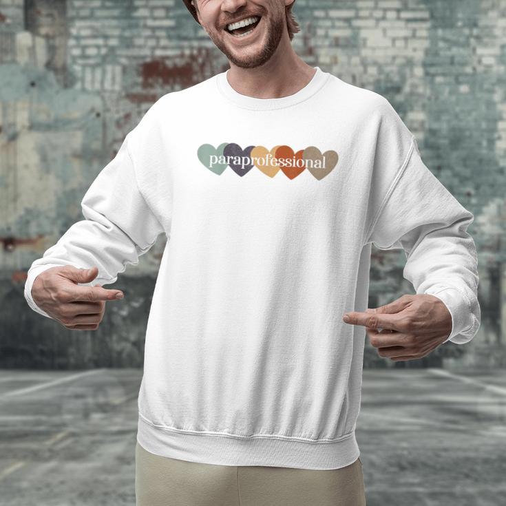 Paraprofessional Teacher Hearts Back To School Teach Rainbow Men Women Kids Men Graphic Sweatshirt, gift for family, gift for coworker Paraprofessional Teacher Hearts Back To School Teach Rainbow Men Women Kids Men Graphic Sweatshirt, gift for family, gift for coworker