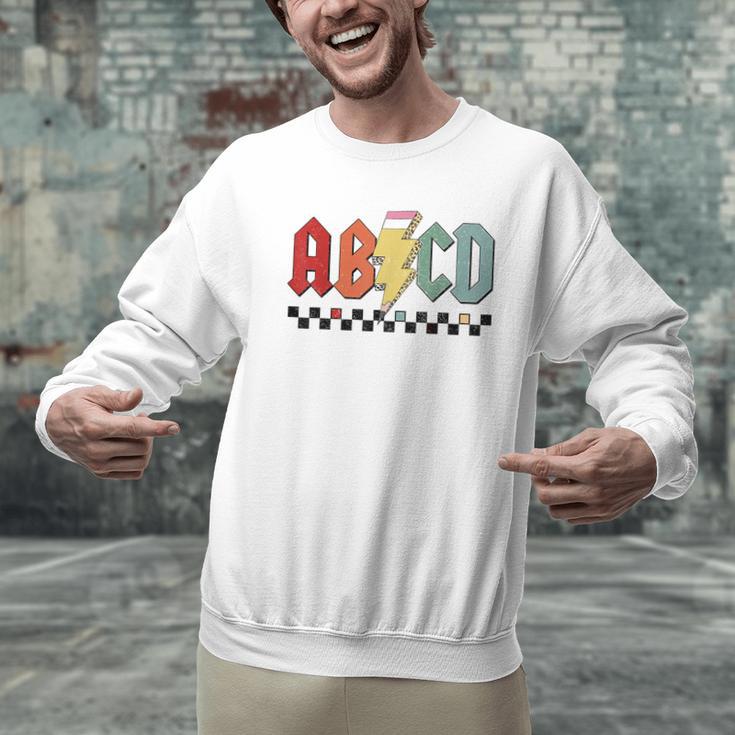 Rock Abcd Back To School Abcd Preschool Teacher Appreciation Men Graphic Sweatshirt, gift for family, gift for coworker Rock Abcd Back To School Abcd Preschool Teacher Appreciation Men Graphic Sweatshirt, gift for family, gift for coworker