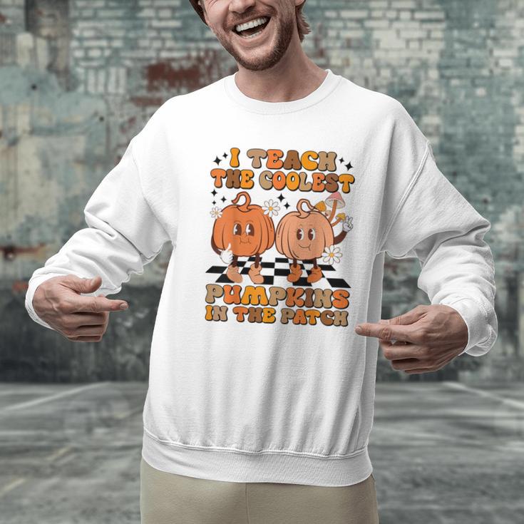 I Teach The Coolest Pumpkins In The Patch Teacher Halloween Men Graphic Sweatshirt, gift for family, gift for coworker I Teach The Coolest Pumpkins In The Patch Teacher Halloween Men Graphic Sweatshirt, gift for family, gift for coworker