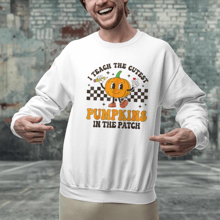 I Teach The Cutest Pumpkins In The Patch Groovy Teacher Fall Men Graphic Sweatshirt, Groovy Teacher Sweatshirts, gift for family, gift for coworker