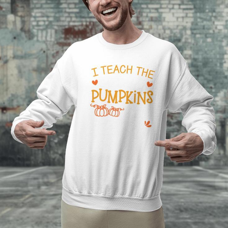 I Teach The Cutest Pumpkins In The Patch Shirt Teacher Men Graphic Sweatshirt, gift for family, gift for coworker