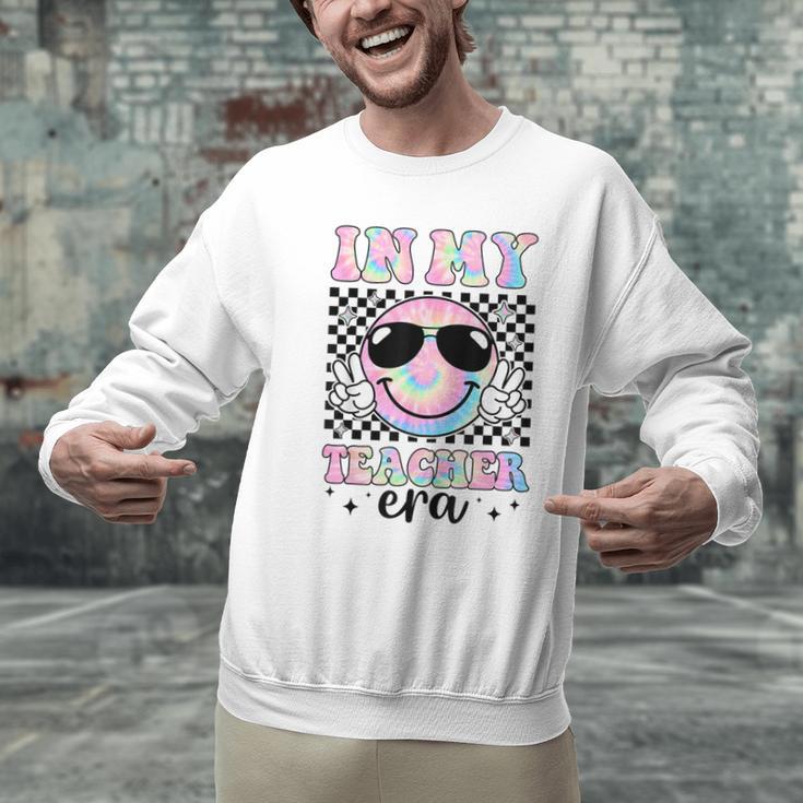 In My Teacher Era Groovy Tie Dye Back To School Cute Teacher Men Graphic Sweatshirt, Groovy Teacher Sweatshirts, gift for family, gift for coworker In My Teacher Era Groovy Tie Dye Back To School Cute Teacher Men Graphic Sweatshirt, Groovy Teacher Sweatshirts, gift for family, gift for coworker