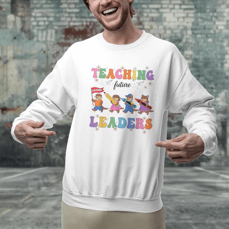 Teaching Future Leaders Otter Back To School Teacher Men Graphic Sweatshirt, Future Teacher Sweatshirts, gift for family, gift for coworker Teaching Future Leaders Otter Back To School Teacher Men Graphic Sweatshirt, Future Teacher Sweatshirts, gift for family, gift for coworker