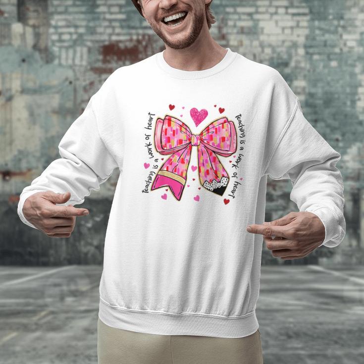 Teaching Is A Work Of Heart Pencil Bow Teacher Valentine Men Graphic Sweatshirt, gift for family, gift for coworker Teaching Is A Work Of Heart Pencil Bow Teacher Valentine Men Graphic Sweatshirt, gift for family, gift for coworker