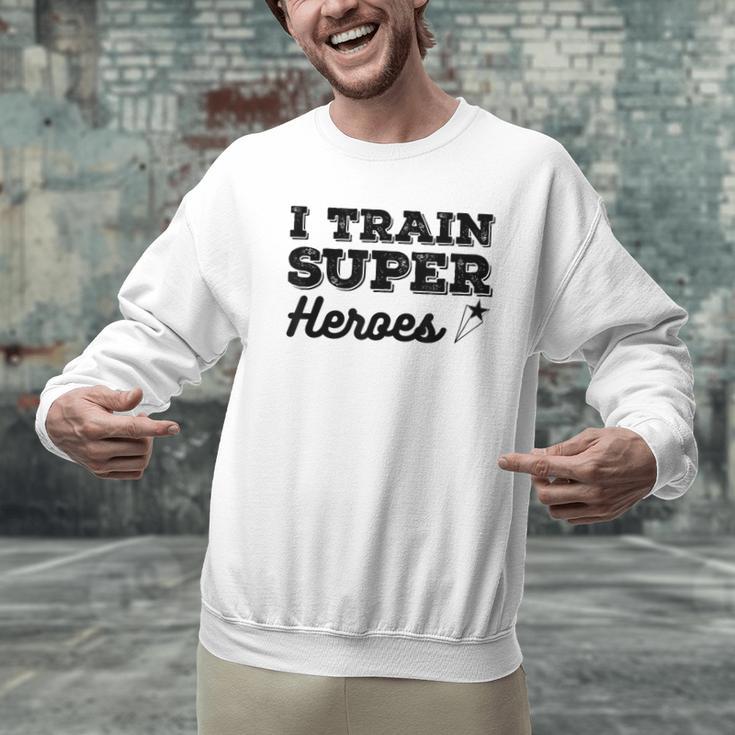 I Train Superheroes For Teacher Coach Men Women Men Graphic Sweatshirt, gift for family, gift for coworker I Train Superheroes For Teacher Coach Men Women Men Graphic Sweatshirt, gift for family, gift for coworker
