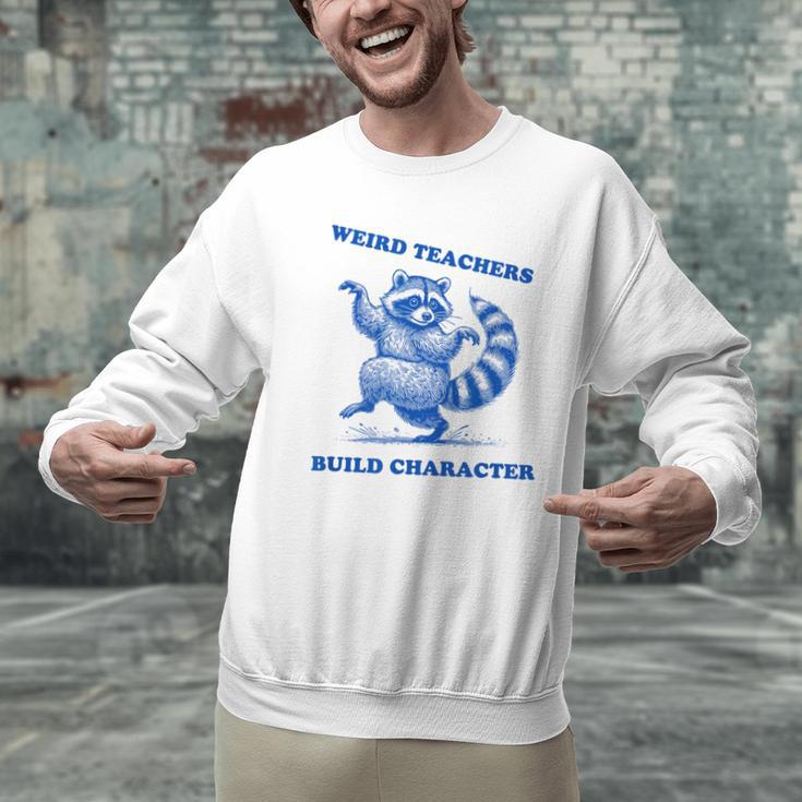 Weird Teachers Build Character Shirt Raccoon Dancing Men Graphic Sweatshirt, gift for family, gift for coworker Weird Teachers Build Character Shirt Raccoon Dancing Men Graphic Sweatshirt, gift for family, gift for coworker