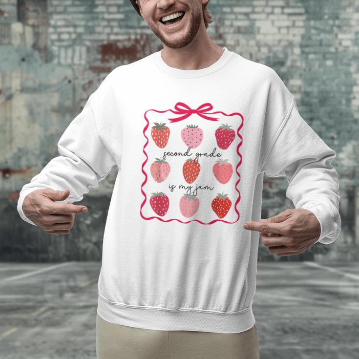 Women Second Grade Is My Jam Strawberry First Kids Teacher Men Graphic Sweatshirt, First Grade Teacher Sweatshirts, gift for family, gift for coworker Women Second Grade Is My Jam Strawberry First Kids Teacher Men Graphic Sweatshirt, First Grade Teacher Sweatshirts, gift for family, gift for coworker