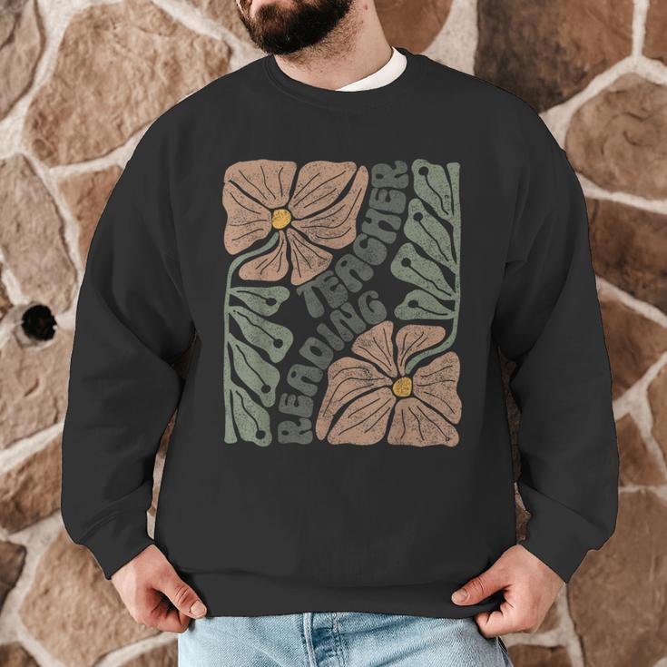 Boho Floral Reading Teacher Retro Reading Specialist Wildfl Men Graphic Sweatshirt, novelty gifts, funny gifts