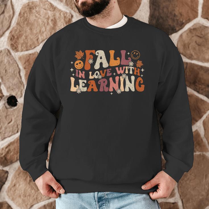 Fall In Love With Learning Autum Thanksgiving Teacher Kids Men Graphic Sweatshirt, novelty gifts, funny gifts