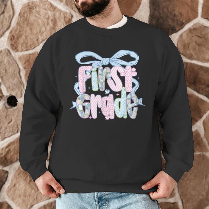 First Grade Coquette Bow Girls Teacher Team 1st Grade Squad Men Graphic Sweatshirt, novelty gifts, funny gifts First Grade Coquette Bow Girls Teacher Team 1st Grade Squad Men Graphic Sweatshirt, novelty gifts, funny gifts